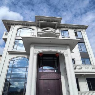 阳江白麻别墅外墙干挂石材效果示例