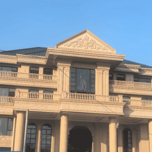 阳江黄金麻别墅外墙干挂石材效果示例